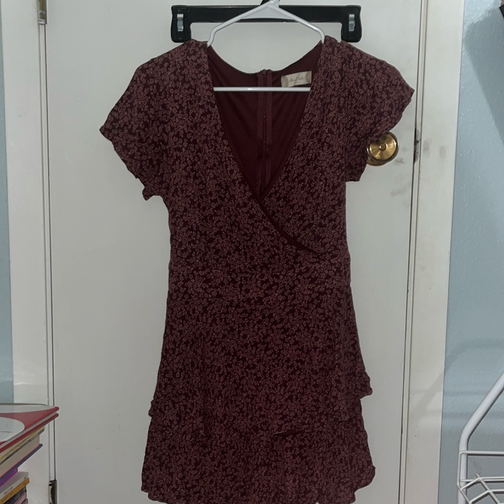 Zip up romper with floral design!! Great condition
